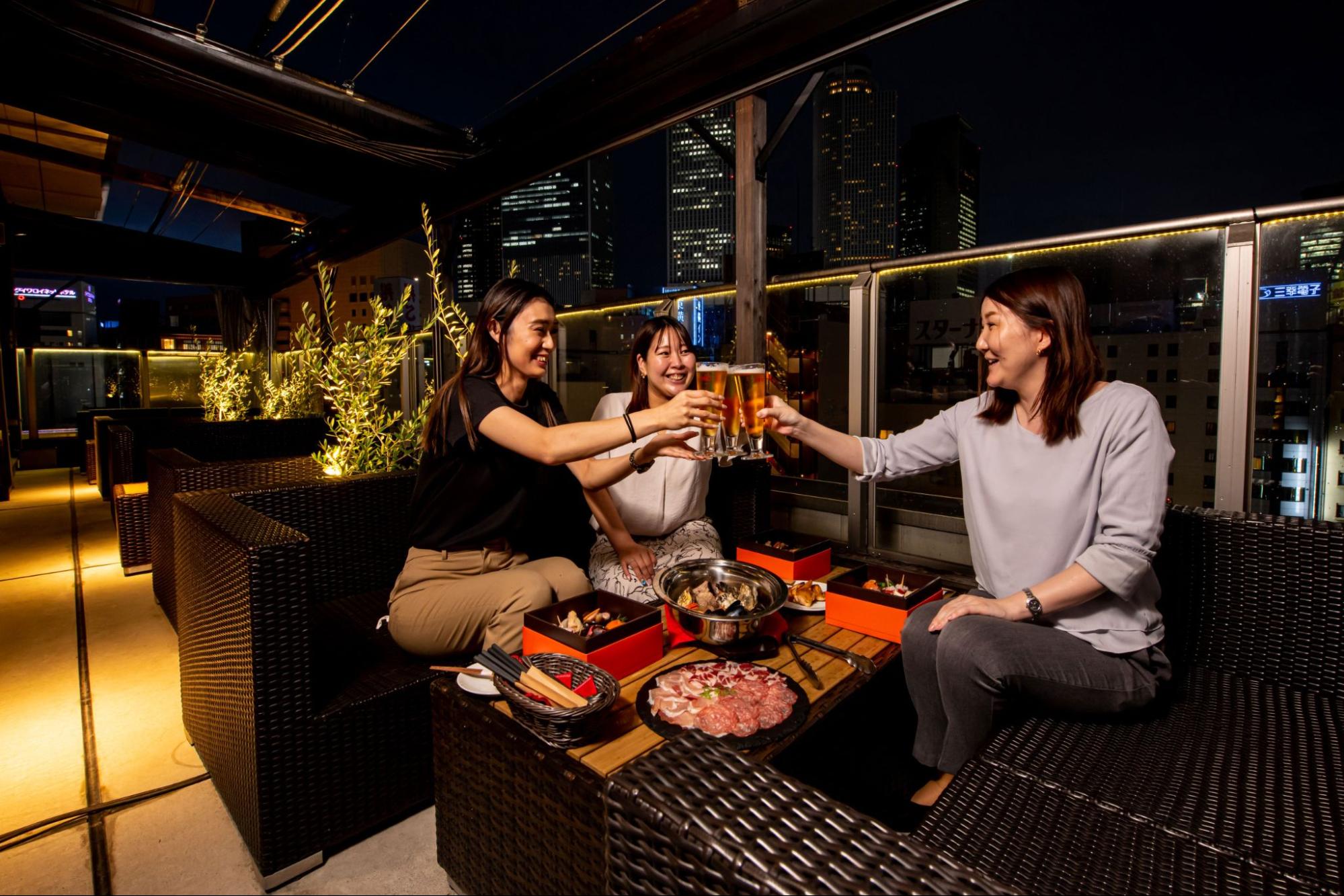 Three women toasting